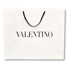 This Brand New Valentino Shopping Bag From The Iconic Designer Brand Is Crafted From A Thick White Paper Material And Features The Valentino Logo Embossed In Black On Both Sides. This Bag Adds A Luxurious Touch To Wrapped Gifts, And Instantly Elevates Your Space When Framed Or Displayed As Decor. Valentino Shopping Gift Bag Embossed Valentino Logo Thick White Paper Material Black Woven Fabric Handles, Drop 6.25" Measurements: 24.75" X 6.25" X 20.75" (Lwh) Brand New Condition Authentic Packaging Valentino Logo Bag, Paper Bag Design, Valentino Logo, Wrapped Gifts, Valentino Garavani Bag, Designer Logo, Paper Material, Party Card, New Sign