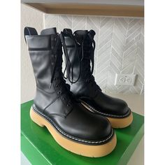 *New Never Worn* Authenticity Card Included And Box. Just Purchased But The Size Is Too Big And Unfortunately Can’t Return Despite Loving These Boots. Iconic Black Leather Boots With Yellow Bubble Sole. Trendy Boots With Vibram Sole And Round Toe, Calf Leather Moto Boots With Vibram Sole, Black Calf Leather Combat Boots With Round Toe, Calf Leather Combat Boots With Rubber Sole, Designer Platform Boots With Leather Sole And Round Toe, Calf Leather Platform Boots With Round Toe, Designer Platform Boots With Round Toe, High-top Moto Boots With Lug Sole In Calf Leather, High-top Calf Leather Moto Boots With Lug Sole