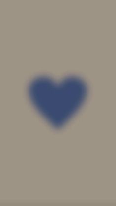 a blue heart on a gray background with the word love written in black below it