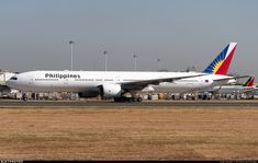 an airplane is parked on the runway at the airport, waiting for passengers to board