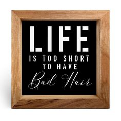 a black and white poster with the words life is too short to have bad hair