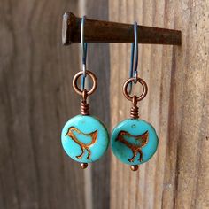 "This listing is for one pair of blue \"chick\" earrings with copper or hypoallergenic titanium ear wire (or color of your choice). These little Czech glass beads are so much fun. This listing is the first in several new earrings in my copper line. In keeping with my hypoallergenic items, I also have it available in titanium also. The titanium ear wires will be colored to match the bead when possible or it will be bronze colored. If you have not discovered titanium yet, and you struggle with you Everyday Copper Dangle Earrings, Blue Pierced Copper Earrings, Blue Copper Pierced Earrings, Nickel Free Copper Dangle Earrings, Nickel Free Copper Drop Earrings, Nickel-free Copper Dangle Earrings, Everyday Copper Round Earrings, Everyday Round Copper Earrings, Unique Hypoallergenic Adjustable Earrings