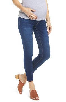 Classic skinnies cut to an ankle-grazing length are crafted with a stretchy, supportive over-the-belly waistband for a comfy fit throughout your pregnancy. 28" inseam; 10" leg opening; 13 1/2" back rise Over-the-belly waistband Faux front pockets; back patch pockets 79% cotton, 20% polyester, 1% spandex Machine wash, tumble dry Imported Hooded Denim Jacket, Mini Sundress, Belly Band, Gowns With Sleeves, Maternity Jeans, Large Fashion, Sanding, Bottoms Pants, Black Denim