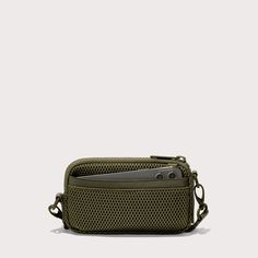 Breathable. Cushiony. Durable. Our lightweight crossbody bag for travel has you covered. Designed for daily adventures and travel too, this dark green Air Mesh sling bag keeps essentials within reach without weighing you down. Drape it across your chest, on your shoulder, or around your neck for the ultimate way to float through your day. Features interior and exterior pockets, an elastic loop, card slots, and a secure zipper closure, it keeps your stuff safe and organized anywhere. Multifunctional Khaki Shoulder Bag For Travel, Casual Portable Shoulder Bag For Everyday Carry, Functional Rectangular Camera Bag With Cell Phone Pocket, Multifunctional Travel Accessories With Adjustable Strap, Versatile Green Portable Shoulder Bag, Practical Khaki Shoulder Bag For Travel, Versatile Green Travel Accessories, Functional Green Travel Accessories For Everyday Use, Functional Green Bags For Everyday Use