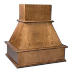 a wooden stove top sitting on top of a white floor