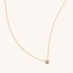 Our Diamond Bezel Necklace is feminine and dainty. A forever piece that you wear every day and pass down for generations. Can be worn alone or layered with your other fav chains. - 18k solid yellow gold - Length: 16 inches - Carat weight: 0.10 ctw - High quality diamonds, G-H color, SI1-2 clarity Minimalist Bezel Set Necklace For Anniversary, Minimalist Necklace With Bezel Setting For Anniversary, Elegant Everyday Solitaire Necklace With Bezel Setting, Elegant Everyday Necklace With Bezel Setting, Elegant Everyday Necklaces With Bezel Setting, Minimalist Necklace With Bezel Setting And Round Pendant, Minimalist Necklace With Smooth Bezel For Anniversary, Timeless Everyday Diamond Necklace With Bezel Setting, Minimalist Smooth Bezel Necklace For Anniversary