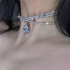 Crystal Choker Necklace Is Made Of High-Quality Alloy And Rhinestones.Chic Design Of This Rhinestone Women Choker Necklace Help You To Be So Eye-Catching In The Crowd. Rhinestone Necklace Doesn't Have Lobster Clasp On The Back,It Is Opening On The Back So This Sparkly Crystal Necklace Is Adjustable And Suitable For Most Women And Girls. Water-Drop Pendant Necklace Not Only Have Great Workmanship,But Also Multiple Usages.It Can Be Used As Choker Necklace,And Also As Shiny Headpiece To Decorate Any Hair Styles. Fashion Silver Rhinestone Necklace Is Suitable For Any Occassions Like Parties, Proms, Fashion Shows, Nightclubs, Anniversary And Etc. And In All Festivals Such As Mothe Bloom Winx, Women Choker Necklace, Preppy Jewelry, Prom Accessories, Silver Diamond Necklace, Jewelry Photoshoot, Rhinestone Choker Necklace, Crystal Choker Necklace, Aesthetic Jewelry