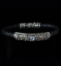 Rainbow Moonstone Leather Bracelet in Sterling Silver with a Balinese design handcrafted by Bluemoonstone Creations. Moonstone Bracelets, Balinese Jewelry, Balinese Design, Rainbow Moonstone Jewelry, Mystic Moon, Moon Collection, The Mystic, Moonstone Bracelet, Spiral Design