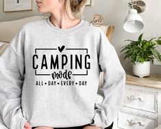 Camping Mode All Day Every Day Sweatshirt, Camping Sweatshirt, Cabin Sweatshirt, Nature Sweatshirt, Travel Sweatshirt, Camping Life Hoodie CAUTION: For security reasons, there is no rope in the throat area for youth hoodie. Hello!! Dear Customer, We're here to give you best Camping sweatshirt, hoodie and crewneck options for you. We want to make everyone smile with our cute , stylish and trendy graphic T-shirts. We can assured you this shirt will be perfect Camping sweatshirt, hoodie and crewnec Campfire Sweatshirt, Gift For Campers, Sorority Sweatshirts, Camping Tee, Adventure Shirt, Nature Shirts, Sports Sweatshirts, Rv Camper