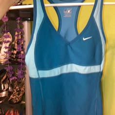 Vintage Nike Sports Tank Never Worn Excellent Vintage Condition Size Xs Fits Up To Small Only Bundle For Discounts Yes Pets Live Here Smokers Don’t Maybe This Isn’t Your Closet If Ur Allergic Vintage Workout Clothes, Blue Racerback Tank Top For Sportswear, Blue Racerback Tank Top Sportswear, Blue Go-dry Tank Top For Sports, Blue Sporty Stretch Tank Top, Blue Stretch Sporty Tank Top, Spring Fitted Sports Tank Top, Fitted Spring Sports Tank Top, Fitted Tank Top For Spring Sports