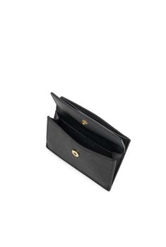 The Kelly Gold Wallet by Nakedvice is a black leather wallet. Featuring a sleek design, a front compartment for all your coins and two card slots on the back, The Kelly Gold Wallet is the perfect wallet for the girl on the go. Colour: BLACK/GOLD Gold Wallets With Card Slots For Business, Black Compact Card Holder With Interior Slots, Compact Black Card Holder With Interior Slots, Classic Black Coin Purse With Interior Card Slots, Black Coin Purse With Card Slots For Evening, Black Evening Coin Purse With Card Slots, Formal Black Coin Purse With Card Slots, Compact Business Coin Purse With Card Slots, Travel Belt