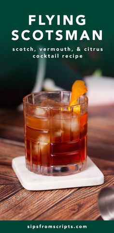 the flying scotsman cocktail is served in a glass with an orange slice