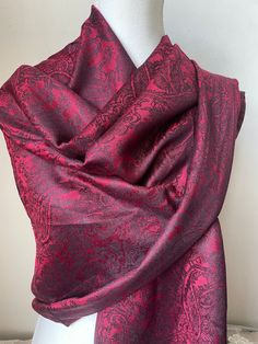 Introducing our luxurious silk pashmina scarf, the ultimate accessory to elevate any outfit. Made with a blend of premium silk and pashmina, this scarf is incredibly soft and lightweight, yet warm and cozy. Size : 180 cm * 72 cm Crafted by skilled artisans, this scarf features a beautiful woven pattern that adds a touch of elegance and sophistication to your look. The natural sheen of the silk and the plush texture of the pashmina create a stunning visual effect that is sure to turn heads. This Luxury Formal Pashmina Shawl, Luxury Pashmina Shawl For Formal Occasions, Elegant Winter Pashmina Shawl For Formal Occasions, Elegant Red Pashmina Scarf, Elegant Winter Formal Pashmina Shawl, Formal Elegant Pashmina Shawl, Classic Formal Pashmina Scarves, Classic Formal Pashmina Scarf, Elegant Silk Shawl For Winter