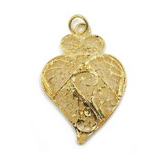 Features The Viana's Heart was created as a symbol of devotion to the Most Sacred Heart of Jesus, but soon became an iconical and emotional heritage of Portugal and of the Portuguese art of filigree. Filigree imitation gold pendent, lacy, to be worn with the Traditional Women's costumes To Clean Do Not Use Abrasive Products; Gold in Color, Not Real Gold Used By The Traditional Portuguese Women Folklore Dancers Measurements: 2" x 1.25" Inch Manufacturing Process Portuguese filigree is the result Valentine's Day Yellow Gold Jewelry With Intricate Design, Valentine's Day Gold Necklace With Intricate Design, Heart-shaped Filigree Jewelry, Heart Shaped Filigree Jewelry, Victorian Heart Pendant Jewelry With Intricate Design, Traditional Heart-shaped Jewelry For Festive Occasions, Victorian Heart Pendant With Intricate Design, Traditional Heart-shaped Yellow Gold Jewelry, Victorian Heart-shaped Filigree Jewelry