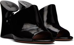 Patent calfskin slip-on heeled sandals in black. · Open round toe · Strap at vamp · Sculptural wedge midsole · Leather outsole with rubber injection · Heel: H4 in Supplier color: Black Modern Slip-on Heels With Heel Loop, Elegant Wedge Heel Mules With Heel Loop, Modern Slip-on Sandals For Formal Occasions, Modern Slip-on Formal Sandals, Black Calf Leather Mules For Summer, Formal Mules With Reinforced Wedge Heel, Modern Calf Leather Wedge Heels, Black Calf Leather Heels For Summer, Formal Mules With Sculpted Wedge Heel