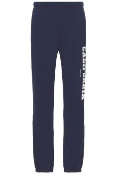 100% cotton.  Made in USA.  Machine wash.  Pull-on styling with elastic waistband.  Logo detail along leg.  3-pocket design.  Fleece lining.  .  .  .  .  .  .  .  .  . Sporty And Rich, Fade To Black, Mens Navy, Sport Pants, Pocket Design, Track Pants, Heather Grey, Made In Usa, Top Brands