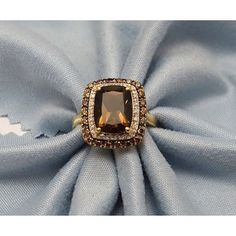 Hello And Thanks For Checking Out Another Great Auction From Hrpawn! We Hope You Enjoy The Photos And Information Presented Herein. If You Have Any Questions, Feel Free To Contact Us For A Prompt And Friendly Response. Elegant 14k Solid Yellow Gold Designer Smoky Quartz, White & Brown Diamond Ring Condition : Pre-Owned Professionally Polished To Look New Total Weight : 3.3 Grams Gold Color : Yellow Gold Ring Size : 6.25 Main Stone : 1 Radiant Cut Smoky Quartz Main Stone Size : 9.9mm X 7.8mm Seco Stone Ring Design, Brown Diamond Ring, Brown Diamonds, Quartz Engagement Ring, Beige Stone, Rose Gold Diamond Ring, Yellow Gold Engagement Rings, Diamond Carat, Brown Diamond