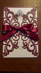 a wedding card with a red ribbon tied around it