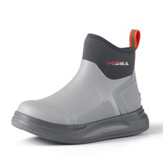 a pair of grey and orange boots on a white background with the word fissa written in red