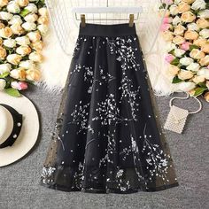 Material:tulle Color: wine red, black, white Features:tulle Size:S,M,L,XL S:lenght:70,Recommended weight:40kg-48kg M:lenght:70,Recommended weight:48kg-52kg L:lenght:70,Recommended weight:52kg-57kg XL:lenght:70,Recommended weight:57kg-63kg Note:Due to different measurement methods,there will be 1-3 error(unite:cm), please understand. Please check the size carefully when you choose items,thank you. Black Tulle Maxi Skirt For Summer, Black Tulle Bottoms With Pleated Skirt, Black Tiered Tulle Maxi Skirt, Black Flared Tulle Skirt, Black Tulle Flared Skirt, Black Long Skirt For Spring, Black Dress With Tulle Full Skirt, Black Tulle Skirt For Fall, Black Tulle Bottoms For Evening