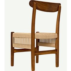 a wooden chair with a woven seat and back rest on it's side, against a white background