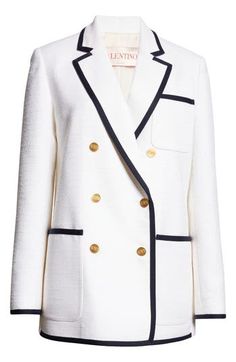 Valentino brings the iconic '80s power suit into the modern era with this wool-kissed tweed blazer featuring golden double-breasted buttons and contrast trim. The straight, slightly elongated cut creates a sleek silhouette that works for both laid-back and polished ensembles. 29" length (size 38IT) Double-breasted button closure Notched lapels Four-button cuffs Chest patch pocket; front patch pockets Back vent Logo-jacquard cupro lining 31% cotton, 31% viscose, 18% wool, 11% llama hair, 9% polya Luxury Double-breasted Tweed Blazer, Designer Tweed Blazer For Workwear, Luxury Double-breasted Tweed Jacket For Work, Luxury Tweed Blazer For Office, Luxury White Tweed Jacket For Work, Luxury Tweed Office Blazer, Luxury White Tweed Jacket, Designer Wool Tweed Jacket For Workwear, White Wool Tweed Jacket In Chic Style