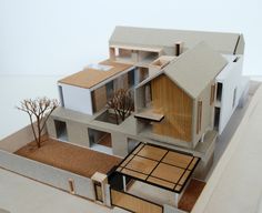 an architectural model of a house on display