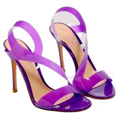 These Brand New Gianvito Rossi Metropolis Sandals Feature A Clear Orchid Colored Pvc Strap That Arcs Across The Foot And Curves Into A Slingback. The Upper Strap Has A Slight Bit Of Stretch Making These Ultra Comfortable. The Sandal Is Highlighted With A Patent Orchid Leather Covered 105mm Heel. Brand: Gianvito Rossi Style: Metropolis 105mm Pvc And Leather Heels Size: Eu 39.5 Material: Pvc Upper, Leather Lining, Covered Heel And Sole Condition: Nwt Retail: $825 Accessories: These Will Be Shipped Elegant Purple Sandals With Branded Heel, Summer Purple Patent Leather Heels, Luxury Purple Open Heel Heels, Purple Patent Leather Party Heels, Purple Patent Leather Heels For Party, Luxury Purple Evening Sandals, Modern Purple Heels For Evening, Modern Purple High Heels, Chic Purple Heels For Gala