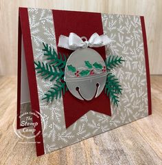 a handmade christmas card with an ornament