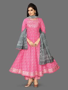 This beautiful Premium Cotton Bandhani Print Anarkali Set With Gotta Patti Work And Cotton Dupatta is the perfect mix between comfort and style. The set consists bandhani print anarkali style kurta with round neck, 3/4th sleeves, ankle length teamed with printed paazzo pants and a printed dupatta to match. Fabric: Cotton Color-Pink Washing instructions: Hand Wash Model is wearing size Small Bandhani Print Anarkali, Gotta Patti Work, Bandhani Print, Gotta Patti, Printed Dupatta, Cotton Dupatta, Anarkali, Ankle Length, Round Neck