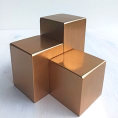 three cubes sitting on top of each other