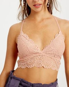 - Removable pad floral lace bralette - Removable padding - Adjustable shoulder strap - Lined - Model is 5' 9" 33-24-34 and wearing a size Small Lace Camisole Bra With Delicate Straps, Spring Lace Bra With Lace Closure, Lace Cami Bra With Delicate Straps, Lace Bra With Lace Closure For Spring, Lace Bra For Spring, Spring Lace Bra With Lace Trim, Spring Camisole Bra With Delicate Lace, Lace Camisole Bra With Removable Pads, Feminine Lace Crop Top With Built-in Bra