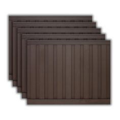 four brown plastic placemats sitting on top of each other in front of a white background