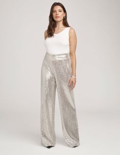 Looking to add some shine to your everyday look? Maybe you need a statement-making piece for an upcoming event? The Metallic High-Rise Wide Leg Pant is exactly what you need. The metallic fabric and a wide-leg silhouette create a beautiful flow and movement. Whether for a party or any other occasion, these pants make a bold, unforgettable statement that will have you turning heads. Fit: High-waisted Long length Fitted in the waist, roomier in the calf and thigh area Dry clean only This item is FINAL SALE. AnneKlein.com does not offer returns, exchanges, and or store credit on clearance items. Metallic Fabric, Wide Leg Pant, Upcoming Events, Long Length, Everyday Look, Wide Leg Pants, Casual Pants, Final Sale, Turning