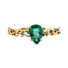 Genuine Emerald Ring/ 14K Gold Pear Cut Emerald Wedding Ring/ Filigree Engagement Ring/ Art Deco Ring/ May Birthstone Ring/ Sushila Jewelry ≫ Features * Items Code: SGR02638_47807 >> Metal Details:-  * Metal: 14K Solid Gold (10K & 18K also available - Additional fees may apply) * More options in gold color: Rose gold, Yellow gold, White gold * Emerald Wt: 0.61 ct. * Gemstone Cut:- Pear Cut * Ring Size: 3 to 10 (All sizes available) ≫ FAQ below for more detail. ✦ Sizing  We can adjust most items to fit your sizing preferences. Most items can be made to any size and length. Please leave a note at checkout or contact us via Etsy conversation.  Even after purchasing the item, you can still ask us to adjust the size or length. We will try our best to fix it if it is possible. ✦ Custom Orders Si Yellow Gold Emerald Ring With Intricate Design, Pear-shaped Emerald Ring For May Birthstone Wedding, Emerald Rings With Intricate Design For Wedding, Teardrop Emerald Wedding Ring In 14k Gold, Pear-shaped Emerald Rings For Wedding, Emerald Pear-shaped Wedding Rings, Fine Jewelry Emerald Ring With Intricate Design For Wedding, Ornate Emerald Ring With Intricate Design For Wedding, 14k Gold Green Rings With Intricate Design