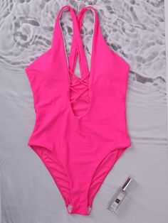 Pink V-neck Bodysuit With Lined Body, V-neck Stretch Bodysuit For Beach Party, Low-cut Beachwear Swimwear For Summer, Low-cut Summer Beachwear Swimwear, Summer Low-cut Beachwear Swimwear, V-neck Bodysuit With Lined Body For Beach Party, Spring Low-cut Swimwear, Stretch Low-cut Bodysuit For Beach, Pink V-neck Party Swimwear