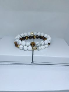 This gorgeous set is perfect bracelet set for every man. Can be worn with suit and tie or Classic jeans fit. Wonderful gift for hubby, son, brother or that special guy in your life. Our bracelets are stretchy and double stringed. Made with 10 MM Brown Tiger Eye & White Howlite beads Boy Bracelets, Beaded Bracelets Handmade, Boys Bracelets, Gifts For Hubby, Brown Tiger, Brown Tiger Eye, Howlite Bracelet, Father's Day Gifts, White Howlite