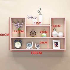 three shelves with different types of clocks and vases on them, measurements for each shelf