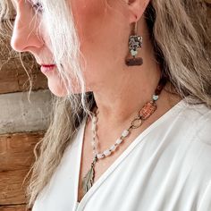 Spirited Woman earrings are the best gift for an authentic cowgirl. Spirited women will boldly and proudly wear such a unique and beautiful pair of earrings. This showpiece earring set features a gorgeous sterling silver medal with a running horse, moon and star with a copper dangle that is hand stamped with Spirited and Woman. All anchored together with authentic turquoise hearts Handmade in Idaho by Weathered Soul exclusively for Bourbon Cowgirl. Limited Edition, high quality jewelry that is a Horse Symbol, Woman Earrings, Running Horse, Turquoise Heart, Copper Jewelry, High Quality Jewelry, Quality Jewelry, Best Gift, Idaho