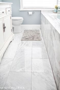 the bathroom is clean and ready to be used by someone in their home or business