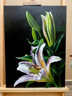 a painting of white lilies on a black background