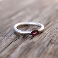 Faceted Garnet Sterling Ring Faceted red oval shaped garnet set in sterling silver ring . stone approx. 30mmx25mm Oval shaped Natural Garnet Size 7 Oval Garnet Rings As Gift, Oval Garnet Ruby Ring As Gift, Oval Garnet Ring For Gift, Oval Sterling Silver Ruby Promise Ring, Oval Ruby Gemstone Stackable Rings, Oval Cabochon Ruby Ring In Silver, Oval Ruby Ring In Sterling Silver, Oval Ruby Ring In Sterling Silver As Gift, Sterling Silver Oval Cabochon Ruby Ring Gift