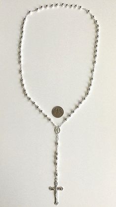 "925 sterling silver italian rosary 30\" long . for protection and good luck made in italy 6 mm beads gr:36 rosario de 925 plata esterlina 30\" largo .para proteccion y buena suerte . hecho en italia 6 mm beads gr: 36" Silver Necklaces With 8mm Sterling Silver Beads, Silver Necklace With 8mm Beads And Adjustable Fit, Sterling Silver Rosary Bracelet With Silver Beads, Sterling Silver Jewelry With 8mm Silver Beads, Spiritual Silver Jewelry With 8mm Beads, Sterling Silver Rosary With Silver Beads As Gift, Spiritual Silver Lariat Necklace As A Gift, Silver Necklace With 8mm Beads For Gifts, Silver Spiritual Lariat Necklace As Gift