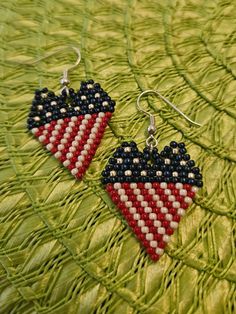 Beaded flag earrings, they hang from 2-4 inches from top of wire to bottom. Flag Beaded Earrings, Flag Beads, Flag Earrings, Diy Seed Bead Earrings, Bead Earring, Seed Beading, Patriotic Flag, Earrings Red, Seed Bead Earrings