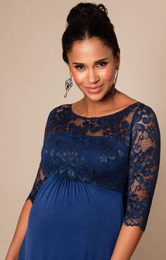 Make an entrance with our Lucia Maternity Gown in stunning Imperial Blue. Designed to fit and flatter at every stage of pregnancy, there’s elegant gathering under the bust to define your waist and a luxurious floor-length skirt with a subtle sheen to skim over your curves. Featuring a sheer lace bodice with mid-length sleeves and a sultry v-shaped back for added drama, you’ll turn heads at every special occasion. Sheer lace neckline V-Shaped Back ¾ length sleeves Jersey skirt with a subtle sheen Fitted Empire Waist Maternity Dress For Party, Elegant Blue Maternity Gown, Elegant Blue Maxi Maternity Dress, Elegant Floor-length Maxi Dress For Maternity, Blue Fitted Maternity Dress For Wedding, Elegant Maxi Maternity Gown, Elegant Maternity Maxi Gown, Blue Maxi Length Maternity Dress For Wedding, Blue Maxi Length Maternity Dress