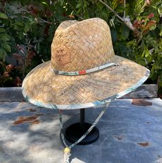 If you like to spend plenty of time at the beach or pool, this straw hat is a must have. Features an adjustable chin cord, funky printed underbrim, and an elastic sweatband for all day comfort. Sizes: M/L - 59cm L/XL - 61cm Casual Wide Brim Palm Leaf Hat, Adjustable Wide Brim Toquilla Straw Hat, Adjustable Coastal Straw Hat Made Of Toquilla, Casual Palm Leaf Sun Hat For Vacation, Casual Palm Leaf Straw Hat For Beach, Casual Palm Leaf Sun Hat For Beach Season, Adjustable Palm Leaf Hat With Flat Brim, Adjustable Flat Brim Palm Leaf Hat, Adjustable Panama Hat With Short Brim