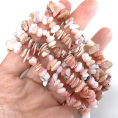 "✦All 100% Genuine Semi-Precious Gemstone Chipped Beads✦ ✦Gemstone: Natural Rhodonite and Natural Pink Opal ✦Color: Pink Tone ✦Shape: Irregular Freeform Chips Nugget Beads ✦Size: 6-10mm ✦Length: 7.5\" inch --- It will fit about 6.75\" wrist! ✦Average Strand Weight: < 4oz ✦QTY: 1 pc / package ♕Beautiful & High Quality Bracelet♕ CLICK BELOW TO CHECK ALL OUR BEAUTIFUL GEMSTONE CHIPS BRACELET. https://www.etsy.com/listing/888858022/handmade-beaded-gemstone-bracelet-beaded Color may vary slightly due to your monitors' color calibration settings. Please allow 0.2-0.5mm measurement error due to different measurement manner. PLEASE feel free to contact us, if you have WHOLESALE QUERY OR ANY OTHER QUESTION Thanks for your kindly understand!" Pink Natural Stones Crystal Bracelet, Pink Spiritual Crystal Gemstone Bracelet, Pink Natural Stone Stretch Bracelet, Rhodonite Bracelet, Gemstone Chips Bracelet, Pink Rhodonite, Balance Bracelet, Chakra Bracelet, Opal Bracelet