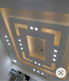 an overhead view of a ceiling with lights