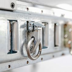 a close up view of a metal latch on a door