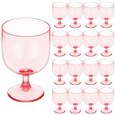 there are many empty wine glasses next to each other on this white background with red rims